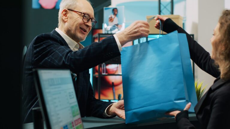 Man buying items from store after hearing instore radio