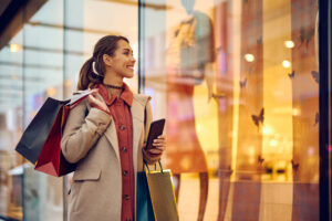 Shopper window shopping in shopping mall enhanced by DMX Africa's digital solutions and in-store messaging