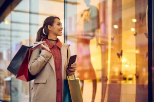 Shopper window shopping in shopping mall enhanced by DMX Africa's digital solutions and in-store messaging